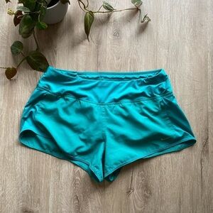 Nike Dri-fit running shorts, teal blue. Inner lining. Women’s size M
